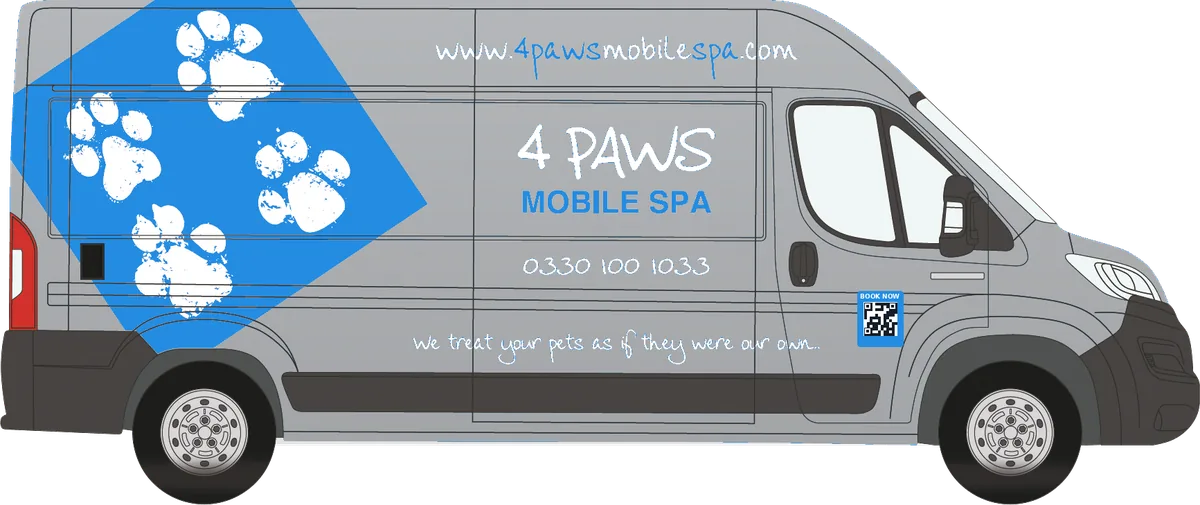 A 4 Paws Mobile Spa van in its blue livery with white paw prints, driving along