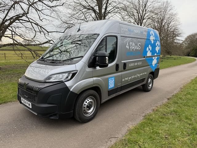 Front and side view of one of our latest 4 Paws Mobile Spa vans